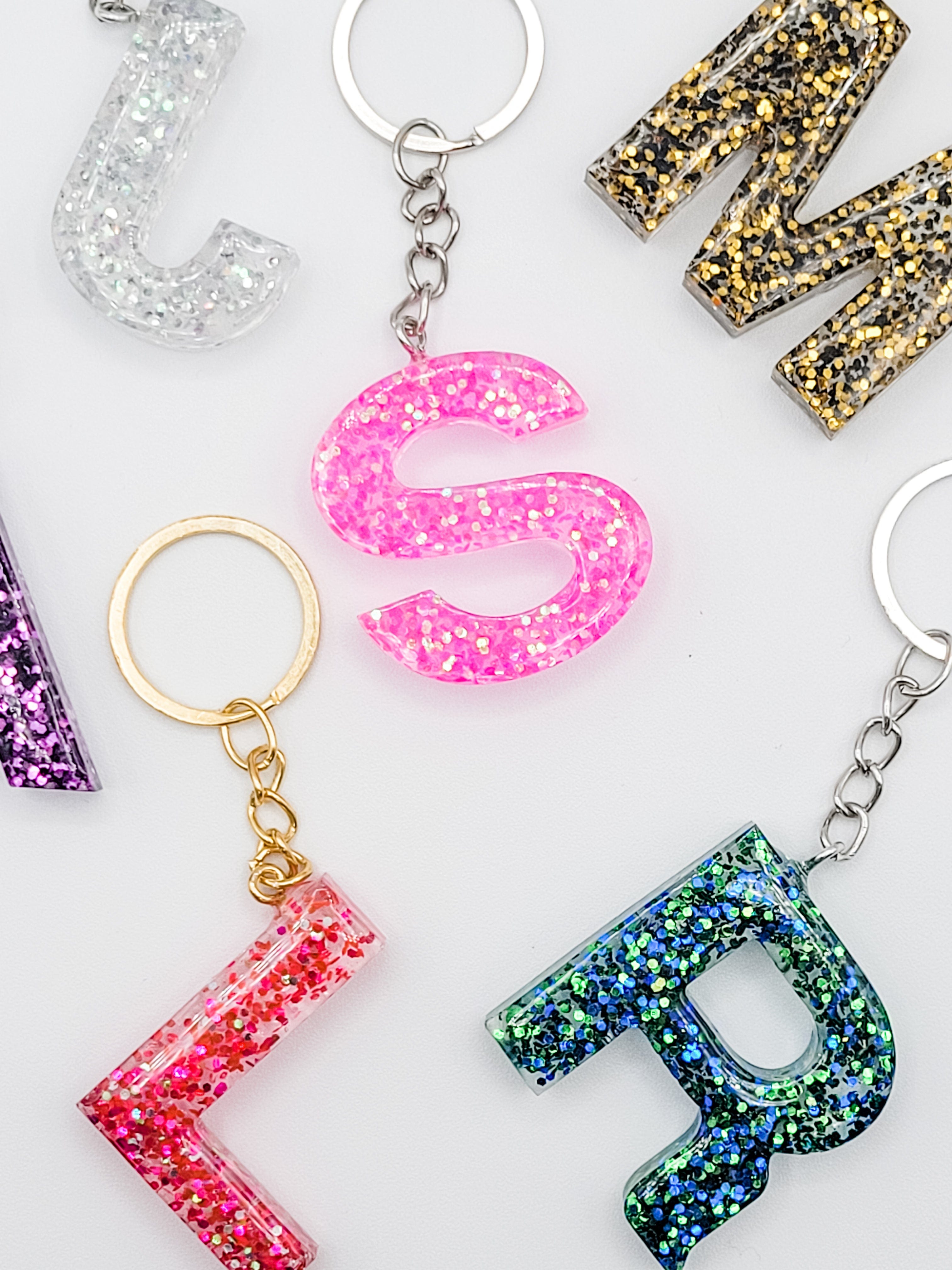 http://jfybrand.com/cdn/shop/products/personalized-handmade-resin-letter-keychain-kc-jfy-127072-bk-os-39284346487024.jpg?v=1672427669