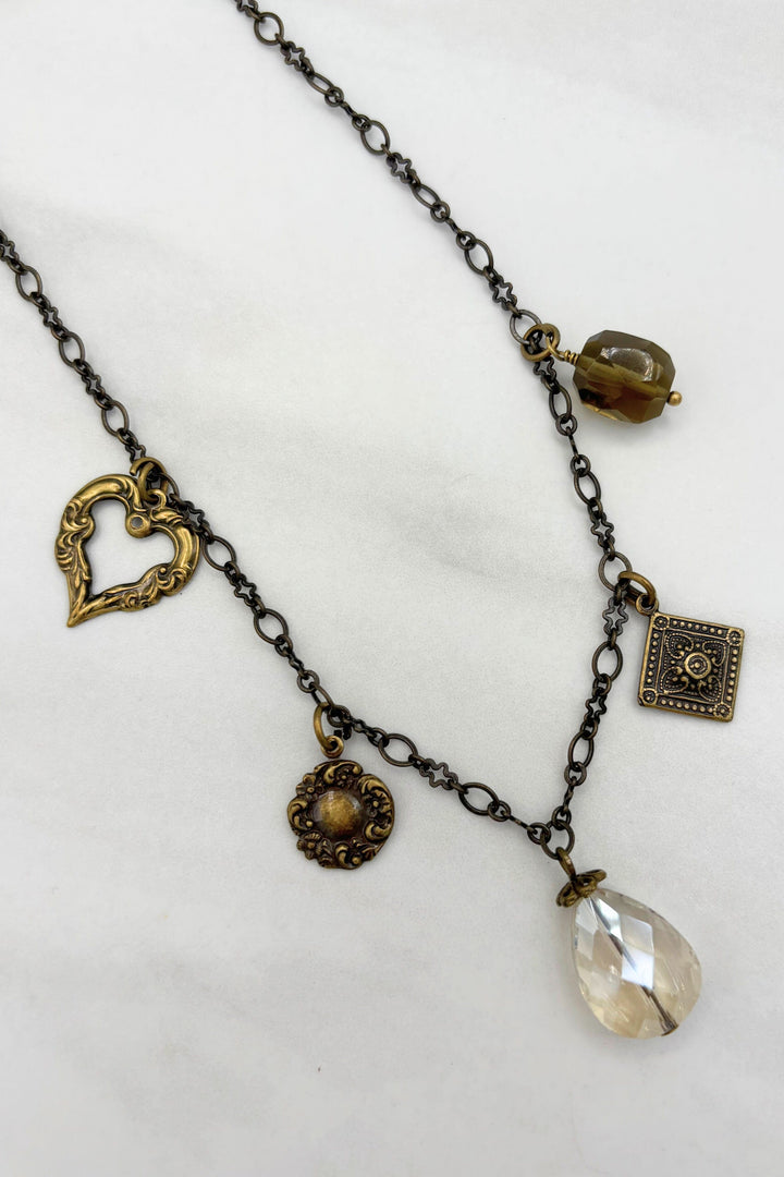 Antiqued Heart Accented Multi Charm Necklace