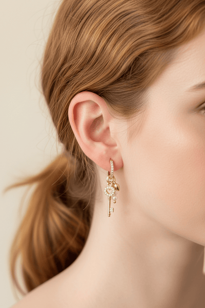 Crystal Studded Lock and Key Charm Huggie Hoops with Small Pearl Bead Accents