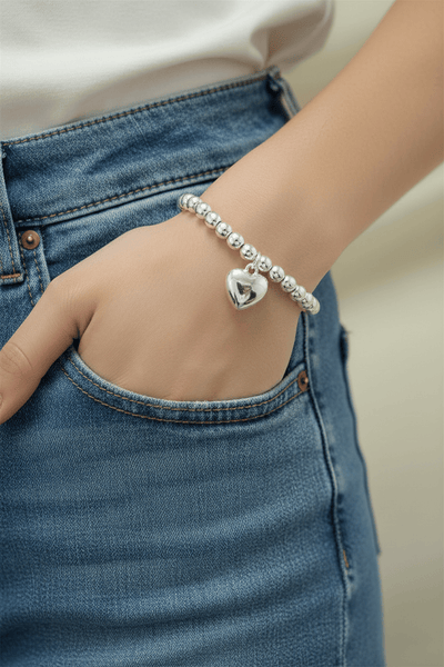 Evopy Organic Shape Bead Stretchy Bracelet with Simple Heart Charm