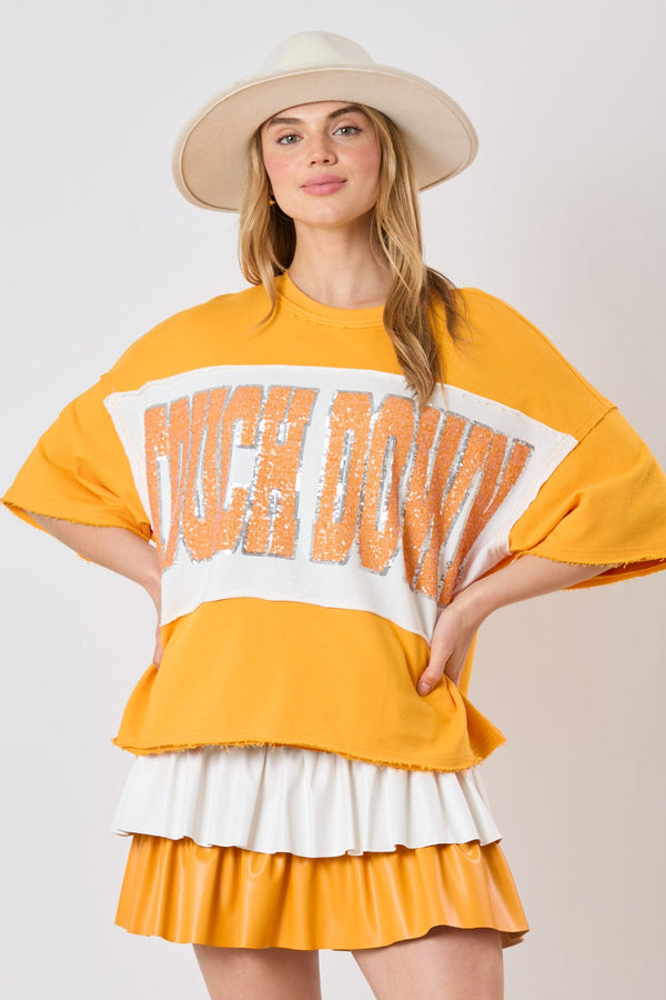 Fantastic Fawn Color Block Loose Fit Short Sleeve Top with Sequin Embroidered "Touch Down"