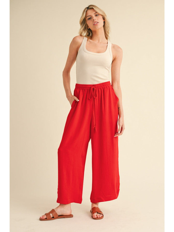 Jodifl Flowy Lightweight Loose Fit Drawstring Waist Pants with Button Detailing at Hem