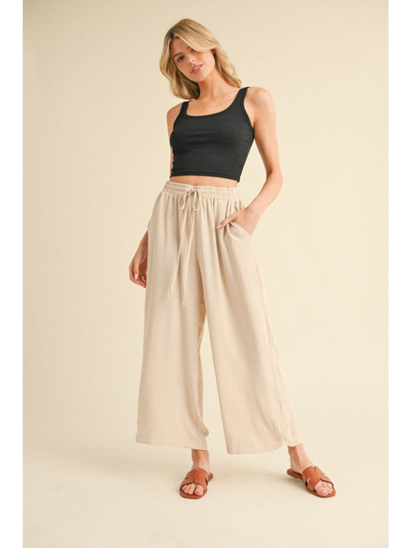 Jodifl Flowy Lightweight Loose Fit Drawstring Waist Pants with Button Detailing at Hem