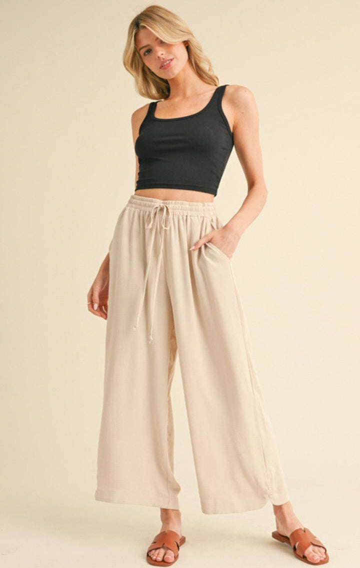 Jodifl Flowy Lightweight Loose Fit Drawstring Waist Pants with Button Detailing at Hem