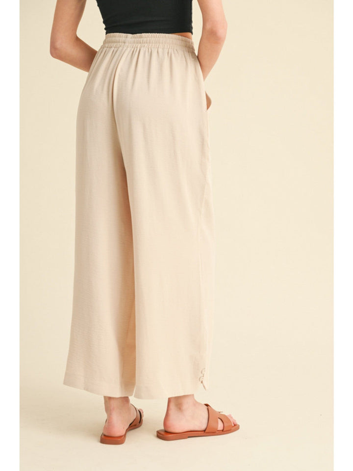 Jodifl Flowy Lightweight Loose Fit Drawstring Waist Pants with Button Detailing at Hem