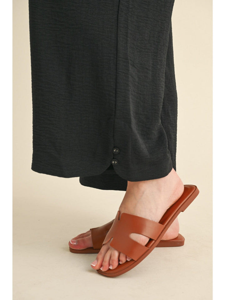 Jodifl Flowy Lightweight Loose Fit Drawstring Waist Pants with Button Detailing at Hem