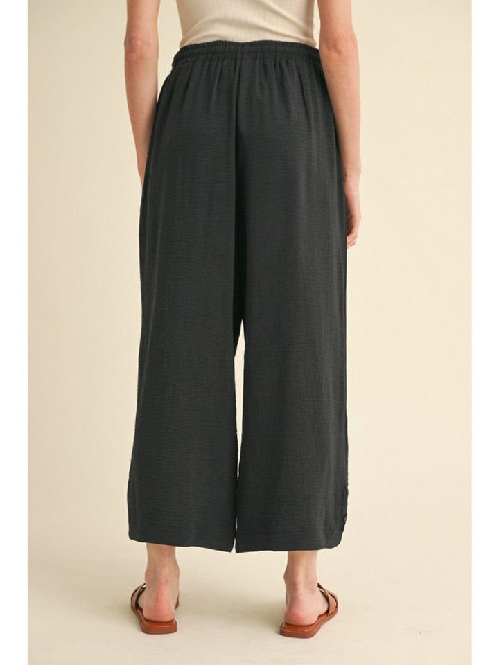 Jodifl Flowy Lightweight Loose Fit Drawstring Waist Pants with Button Detailing at Hem