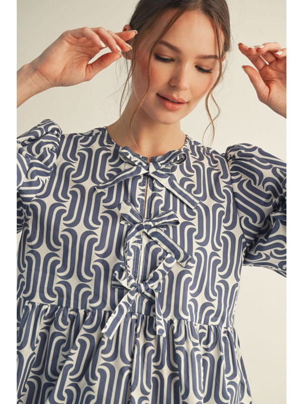 Jodifl Geometric Pattern Front Tie Peplum Top