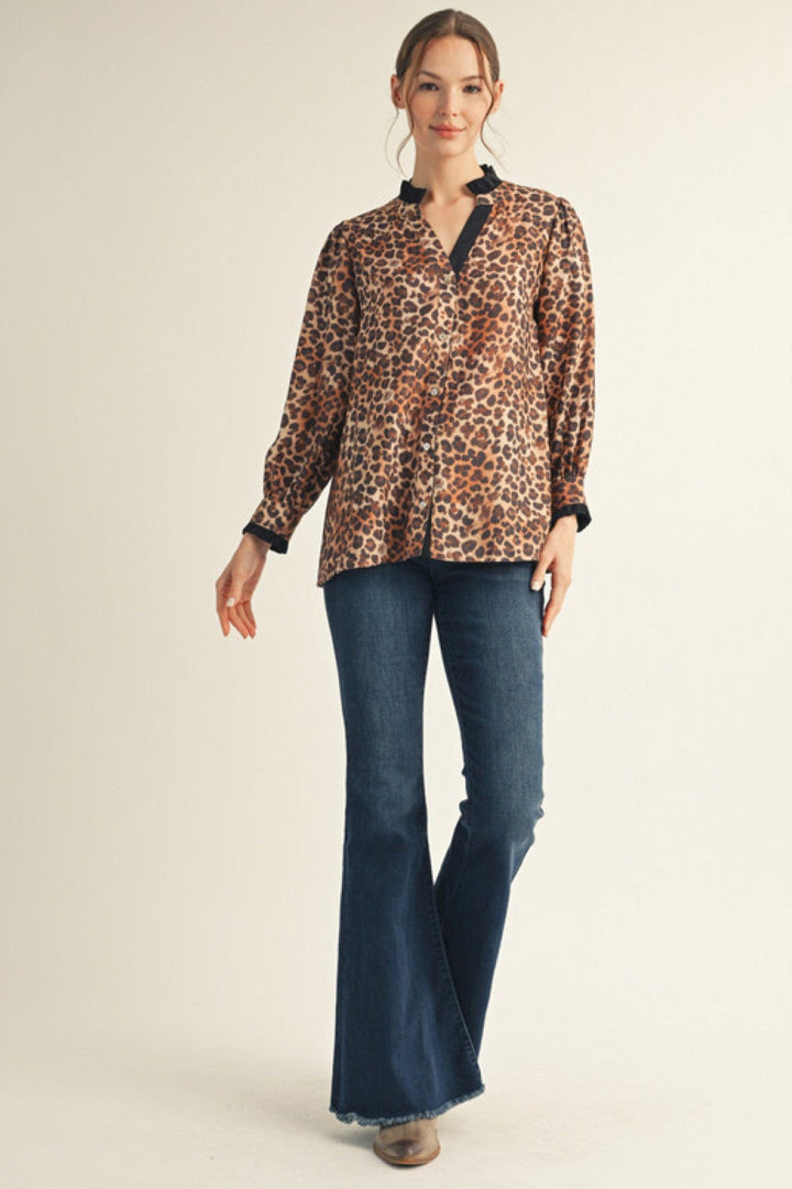 Jodifl Long Sleeve Contrast Color Accented Animal Print Split Neckline Top