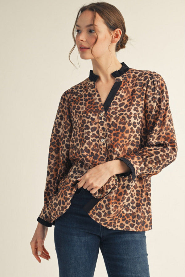 Jodifl Long Sleeve Contrast Color Accented Animal Print Split Neckline Top