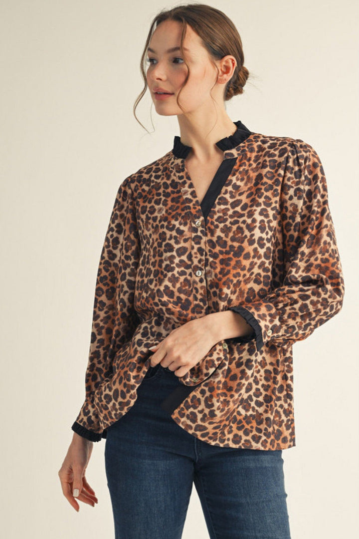 Jodifl Long Sleeve Contrast Color Accented Animal Print Split Neckline Top