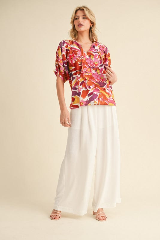 Jodifl Multicolor Print Tie Neckline Raglan Short Sleeve Top