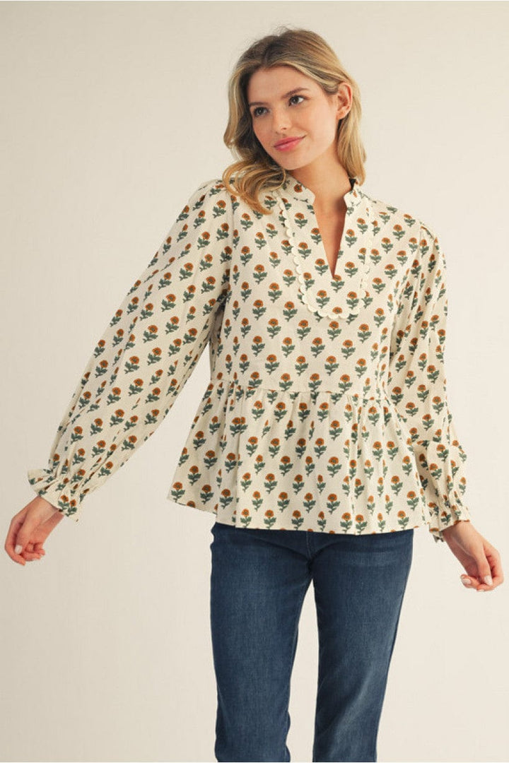 Jodifl Ruffled Long Sleeve Floral Peplum Top