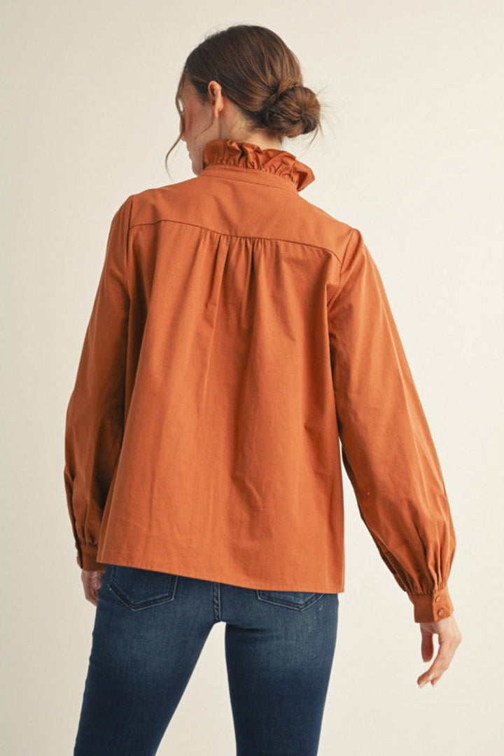 Jodifl Wrap Around Ruffle Neckline and Button Placket Top