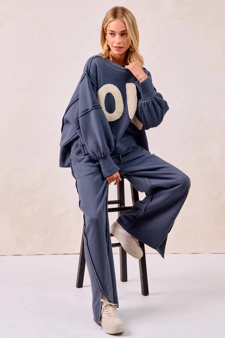 LOVE Patchwork Sherpa Lettering Out Seam Pullover Sweatshirt