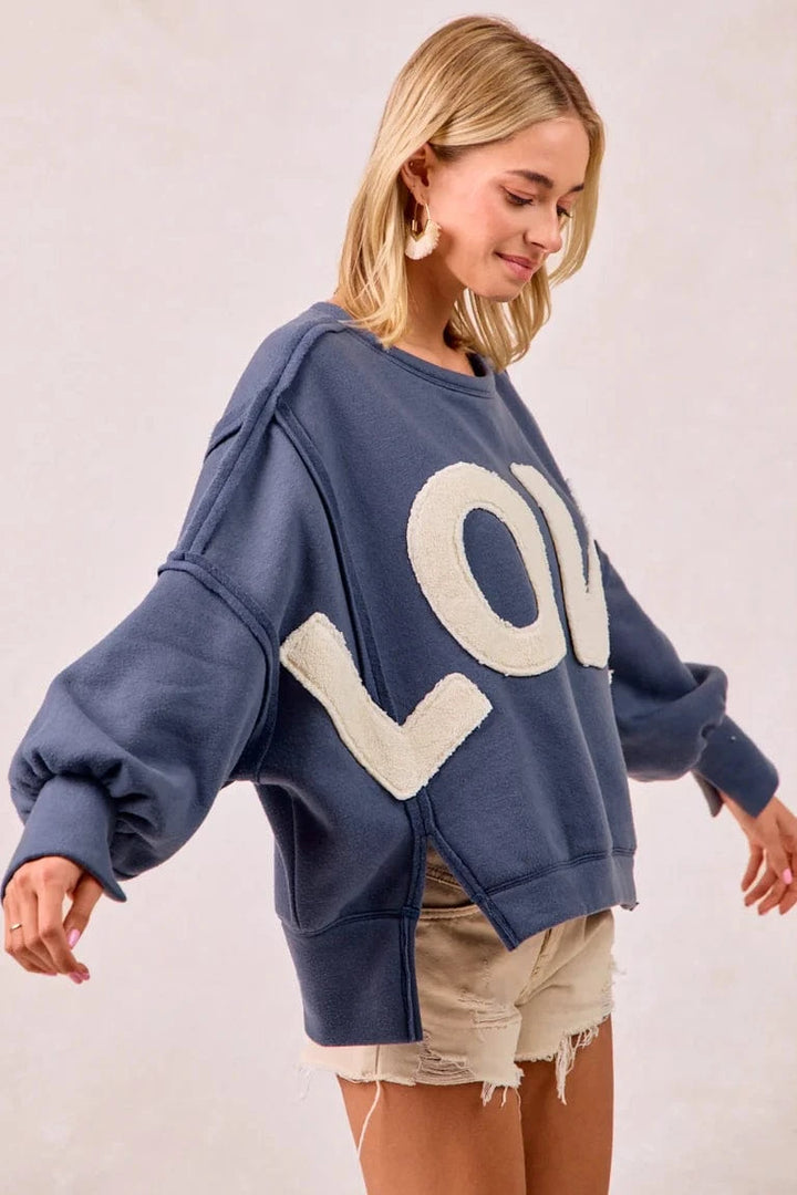 LOVE Patchwork Sherpa Lettering Out Seam Pullover Sweatshirt