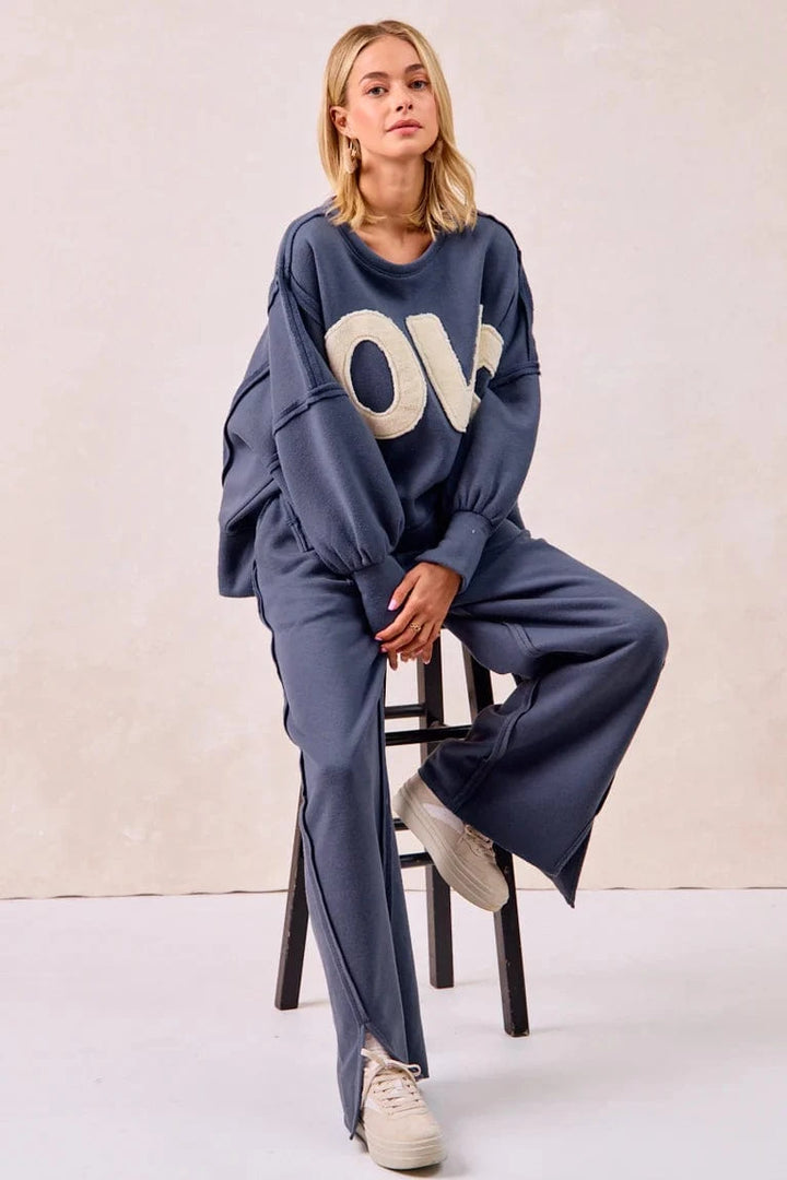 LOVE Patchwork Sherpa Lettering Out Seam Pullover Sweatshirt