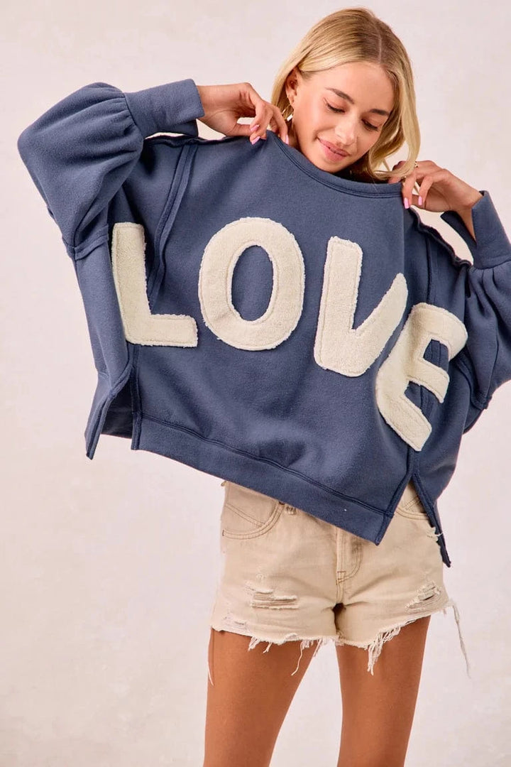LOVE Patchwork Sherpa Lettering Out Seam Pullover Sweatshirt