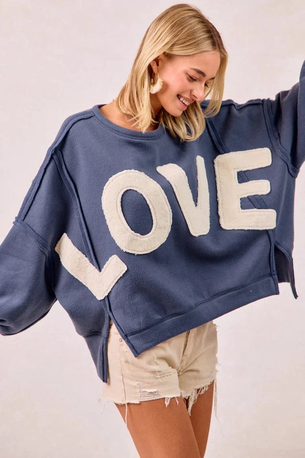 LOVE Patchwork Sherpa Lettering Out Seam Pullover Sweatshirt