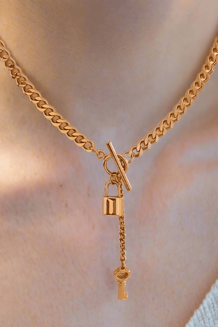 Stainless Steel Solid Curb Chain with Lock and Key Charms Dangling from Center Toggle Clasp