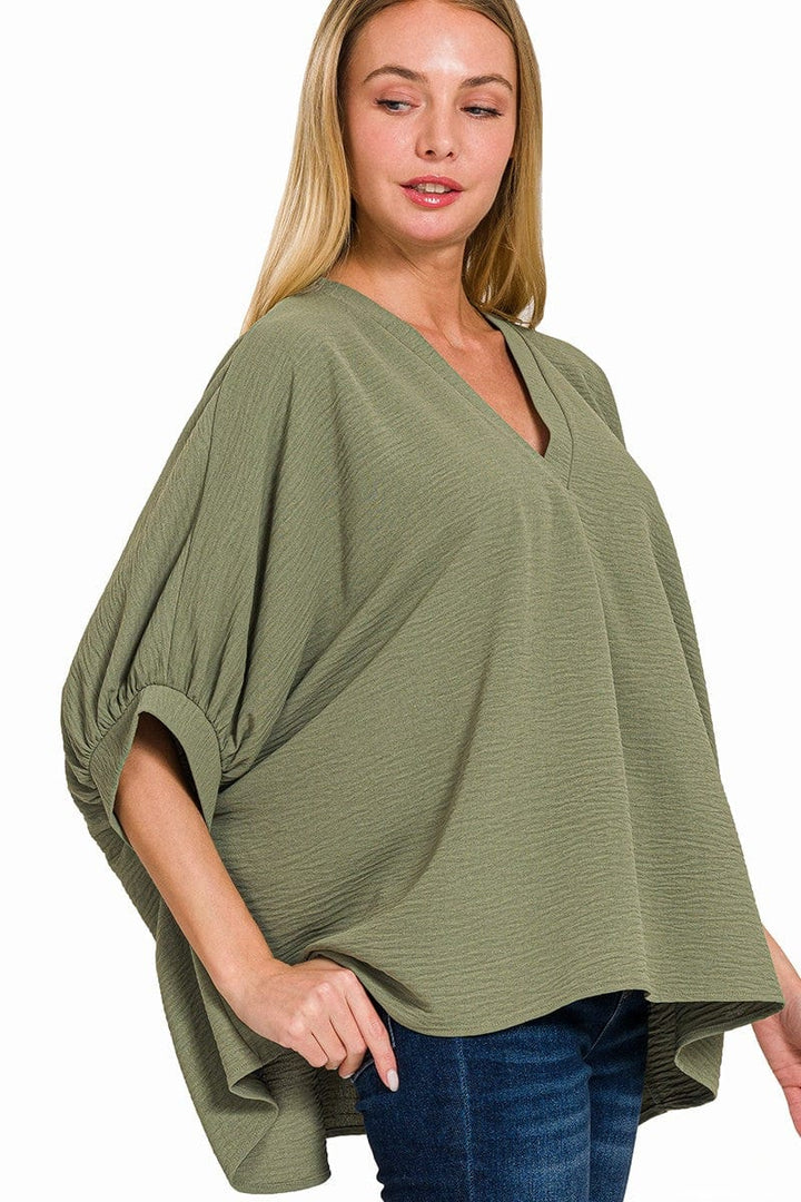 Zenana Woven Airflow V-Neck Band Cuff Half Puff Sleeve Top