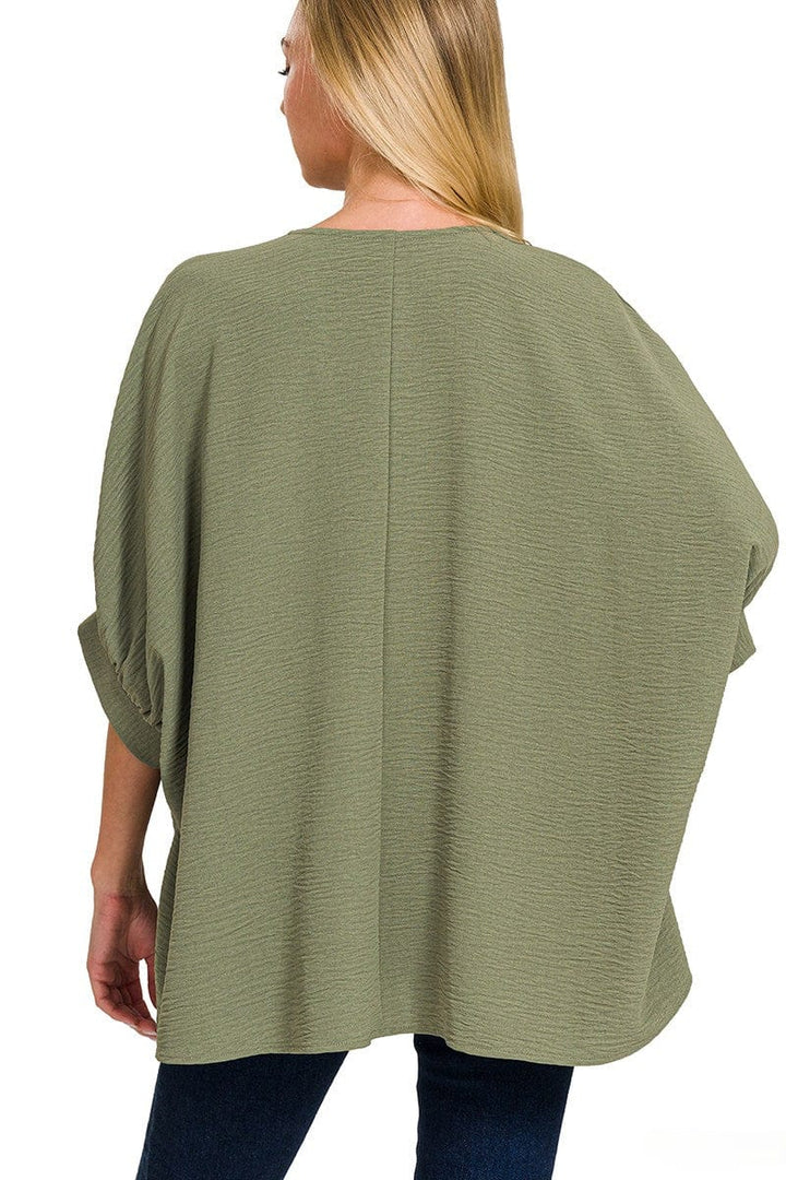 Zenana Woven Airflow V-Neck Band Cuff Half Puff Sleeve Top