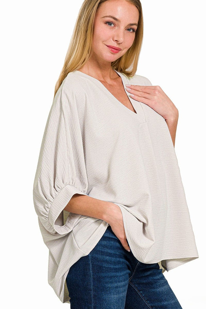 Zenana Woven Airflow V-Neck Band Cuff Half Puff Sleeve Top