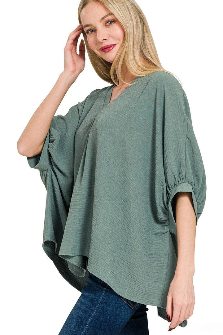 Zenana Woven Airflow V-Neck Band Cuff Half Puff Sleeve Top