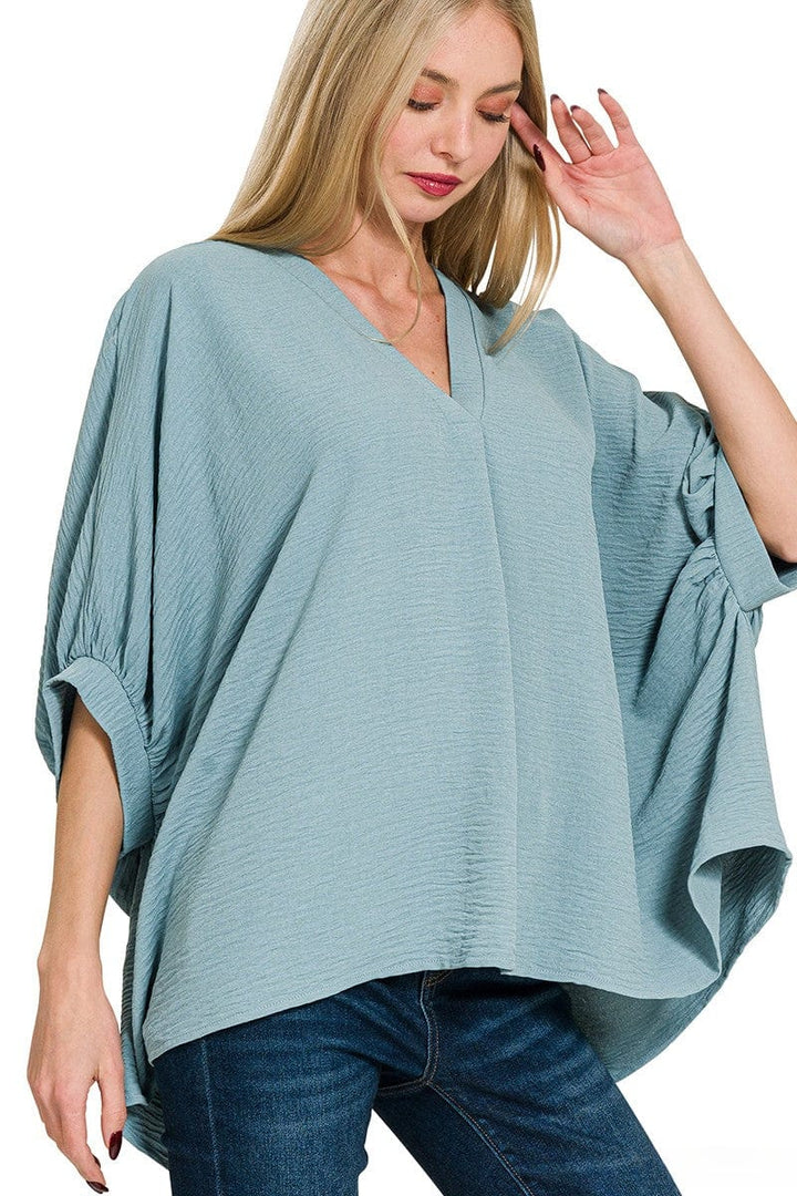Zenana Woven Airflow V-Neck Band Cuff Half Puff Sleeve Top