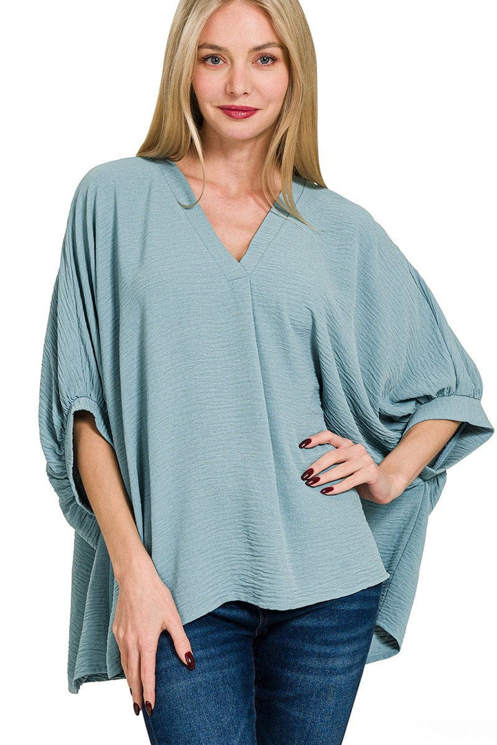 Zenana Woven Airflow V-Neck Band Cuff Half Puff Sleeve Top