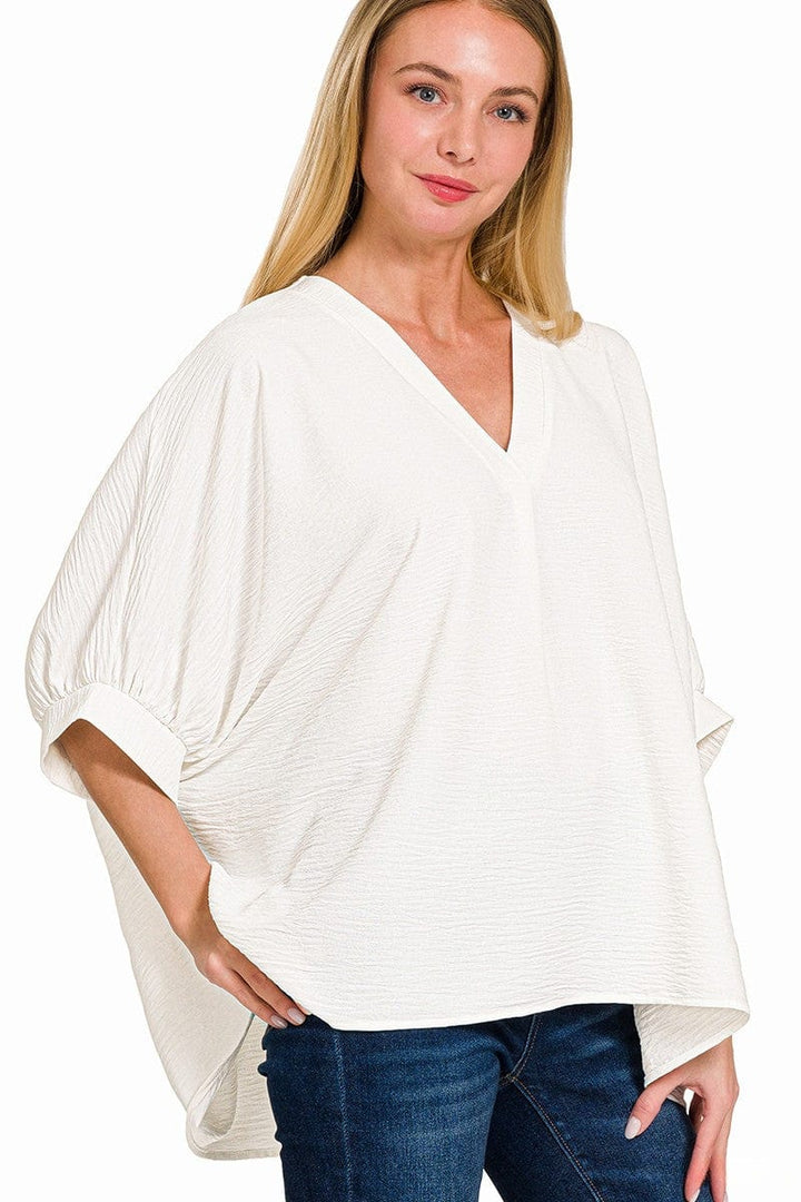 Zenana Woven Airflow V-Neck Band Cuff Half Puff Sleeve Top
