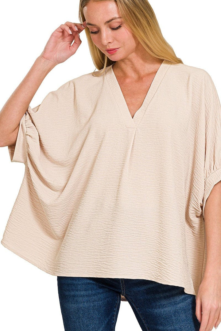 Zenana Woven Airflow V-Neck Band Cuff Half Puff Sleeve Top