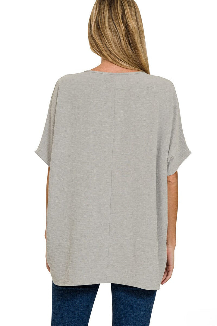 Zenana Woven Airflow V-Neck Dolman Short Sleeve Pocket Top