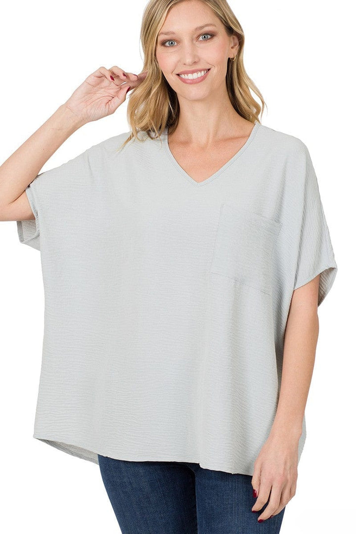 Zenana Woven Airflow V-Neck Dolman Short Sleeve Pocket Top