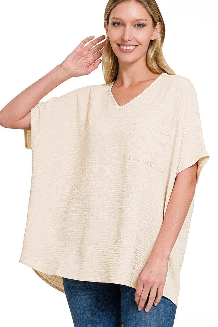 Zenana Woven Airflow V-Neck Dolman Short Sleeve Pocket Top