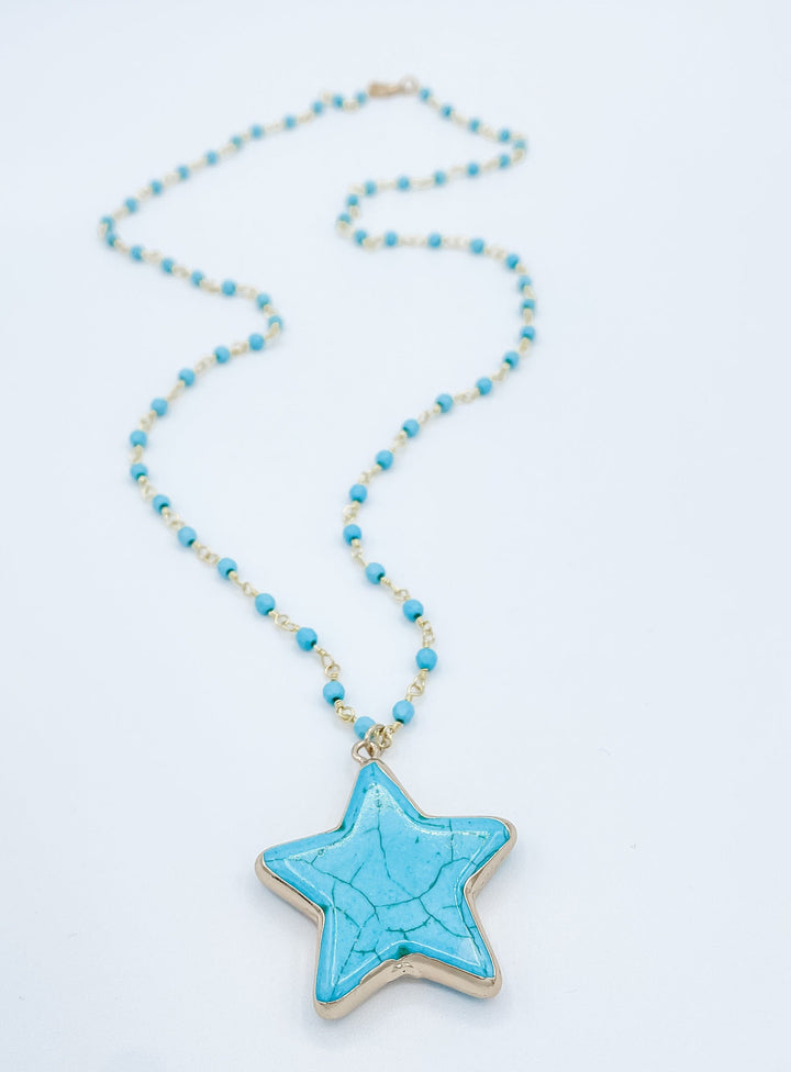 Blue Star Pendant on Blue and Gold