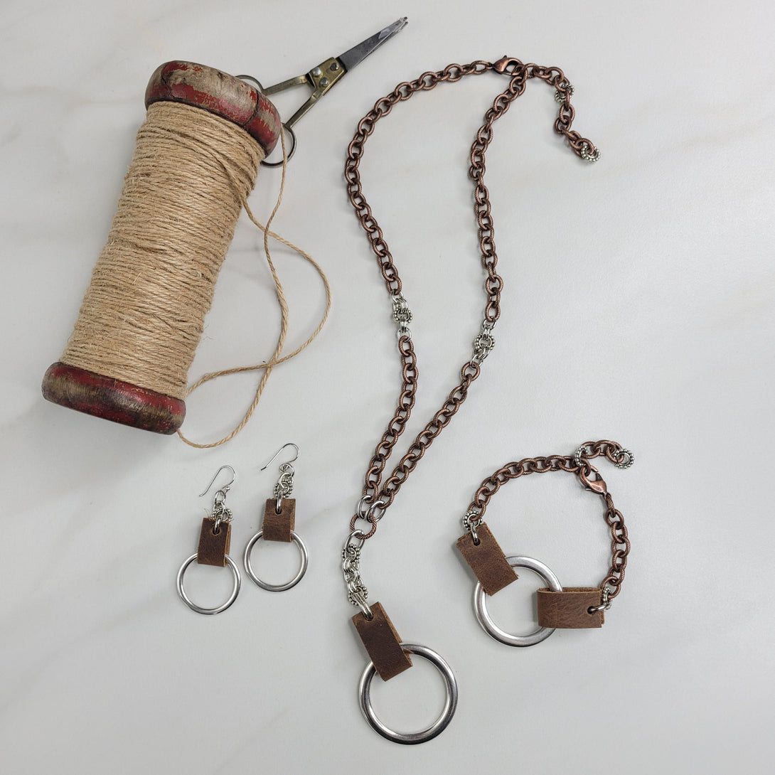 Fallon Handmade Necklace with Etched Cable Chain, Leather Strap, and Silver Ring Pendant