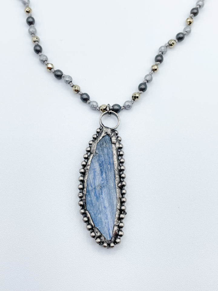 Long Beaded Necklace with Blue Stone Slice Pendant