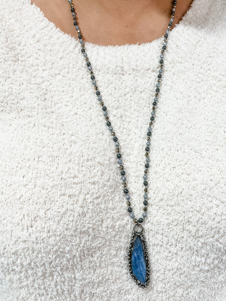 Long Beaded Necklace with Blue Stone Slice Pendant