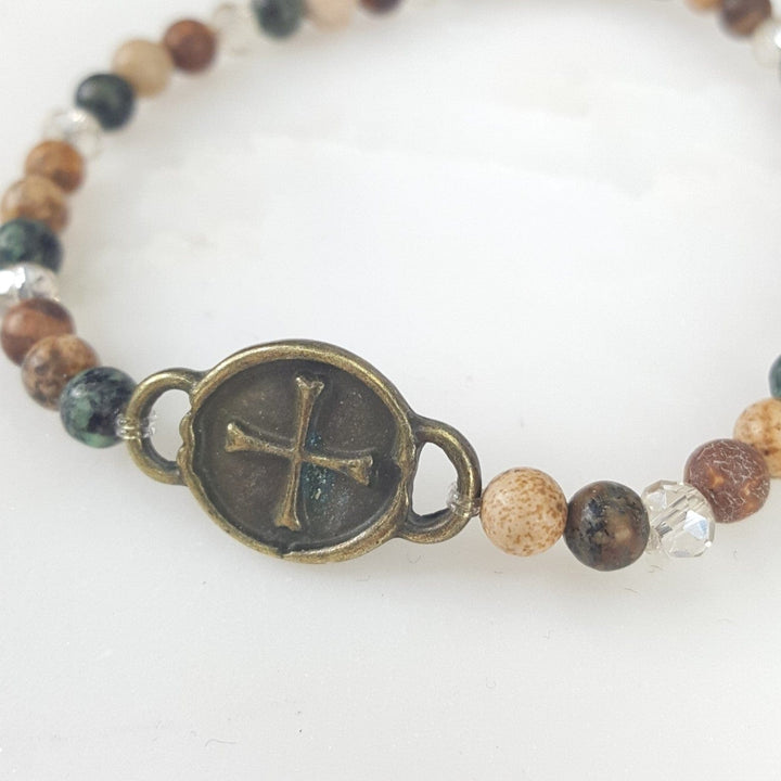 Multi Stone Bracelet with a Cross Accent