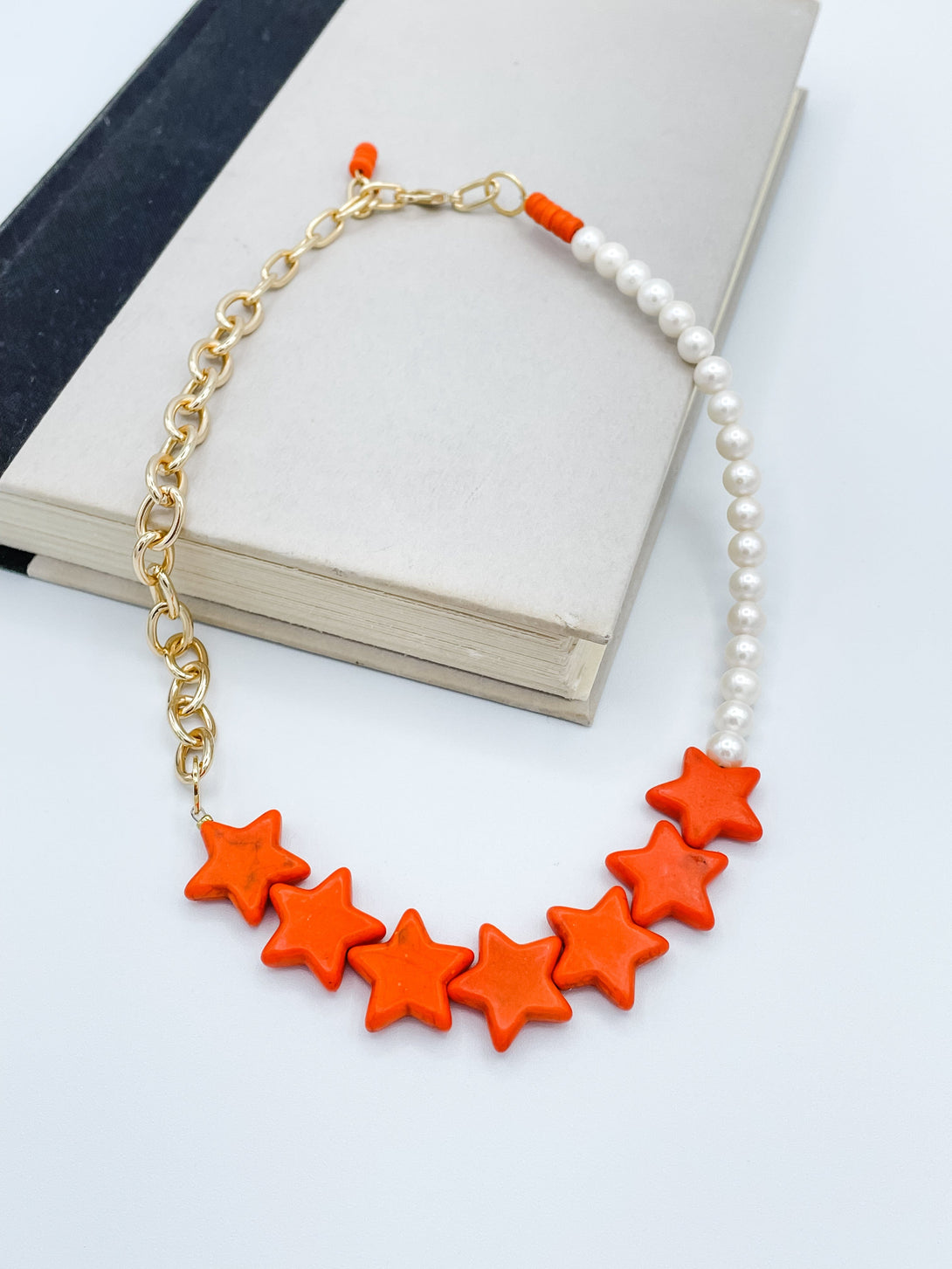 Seven Orange Star Necklace with Gold Chain and Pearls