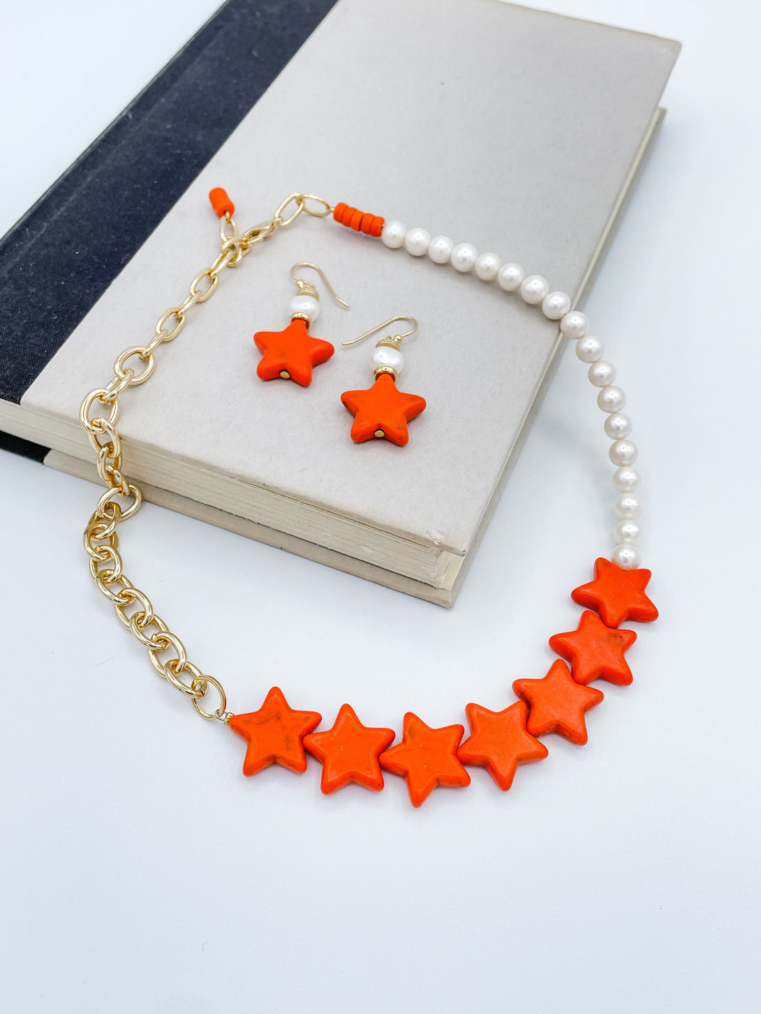 Seven Orange Star Necklace with Gold Chain and Pearls