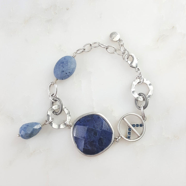 Silver Bracelet with Peace Sign and Large Blue Stone