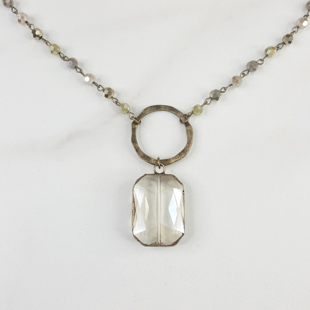 Women's Statement Necklace with Reflective Beads and Drop Feature with Large Connector Ring and Large Crystal Accent Pendant