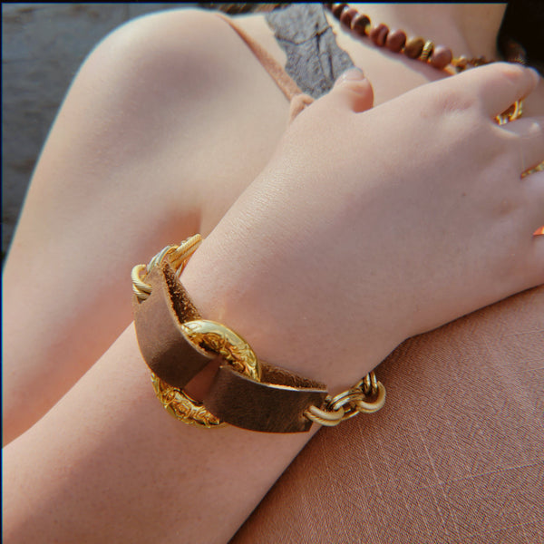 Handmade bracelet with gold plated cable chain, leather, and vintage pendant